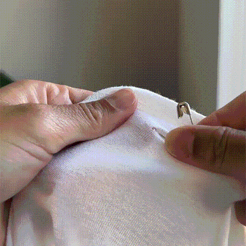 danceSNAPS securing a competition number without damaging the costume